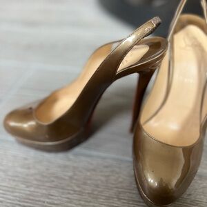 Used Christian Louboutin Beige Patent Leather
Bianca Slingback Sandals